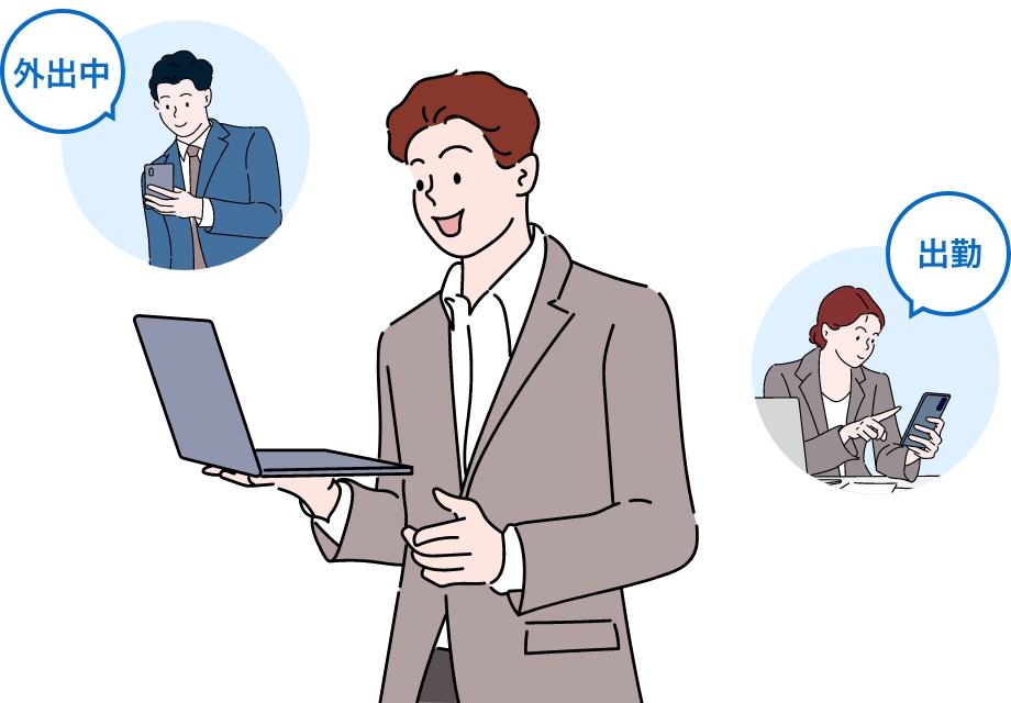 スタッフの行動予定をPCで確認する男性